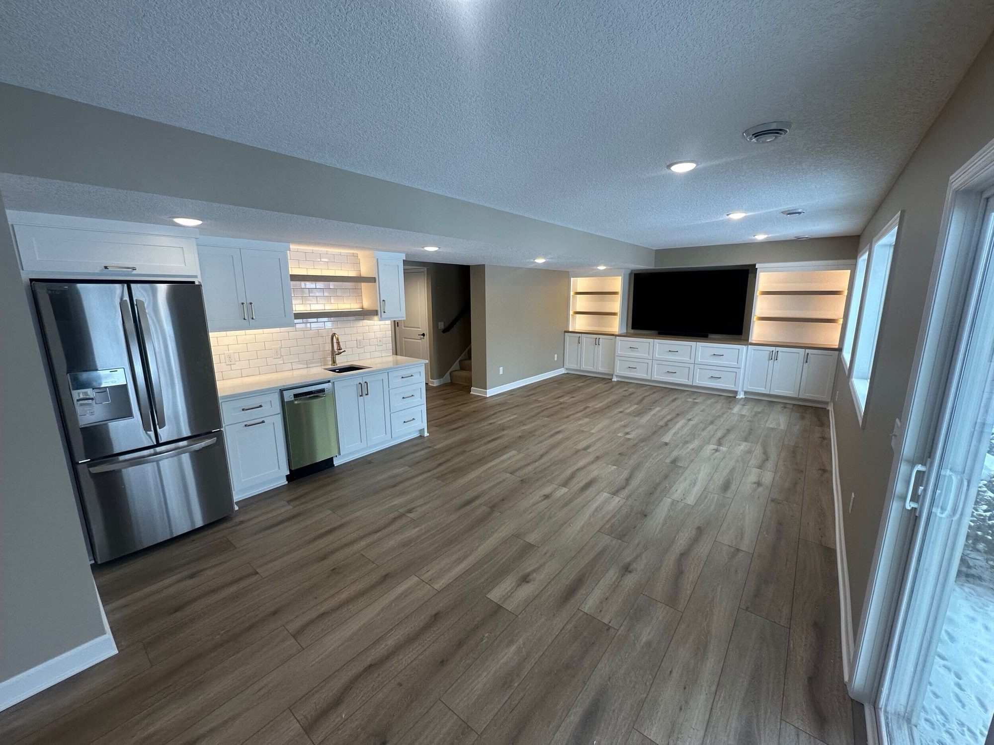 Finished basement family room, Chanhassen MN by BN Builders