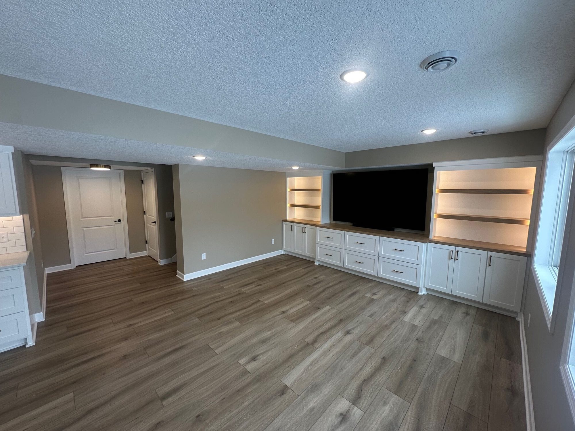 Finished basement living space by BN Builders