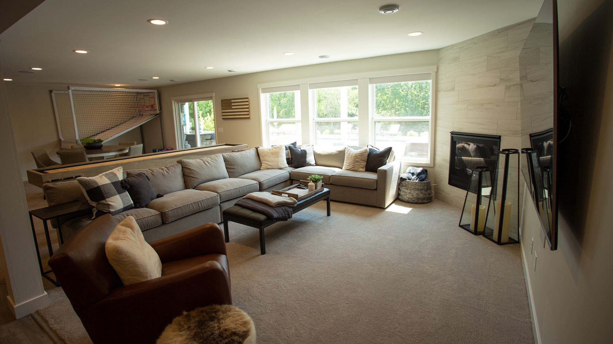 Finished basement family room by BN Builders
