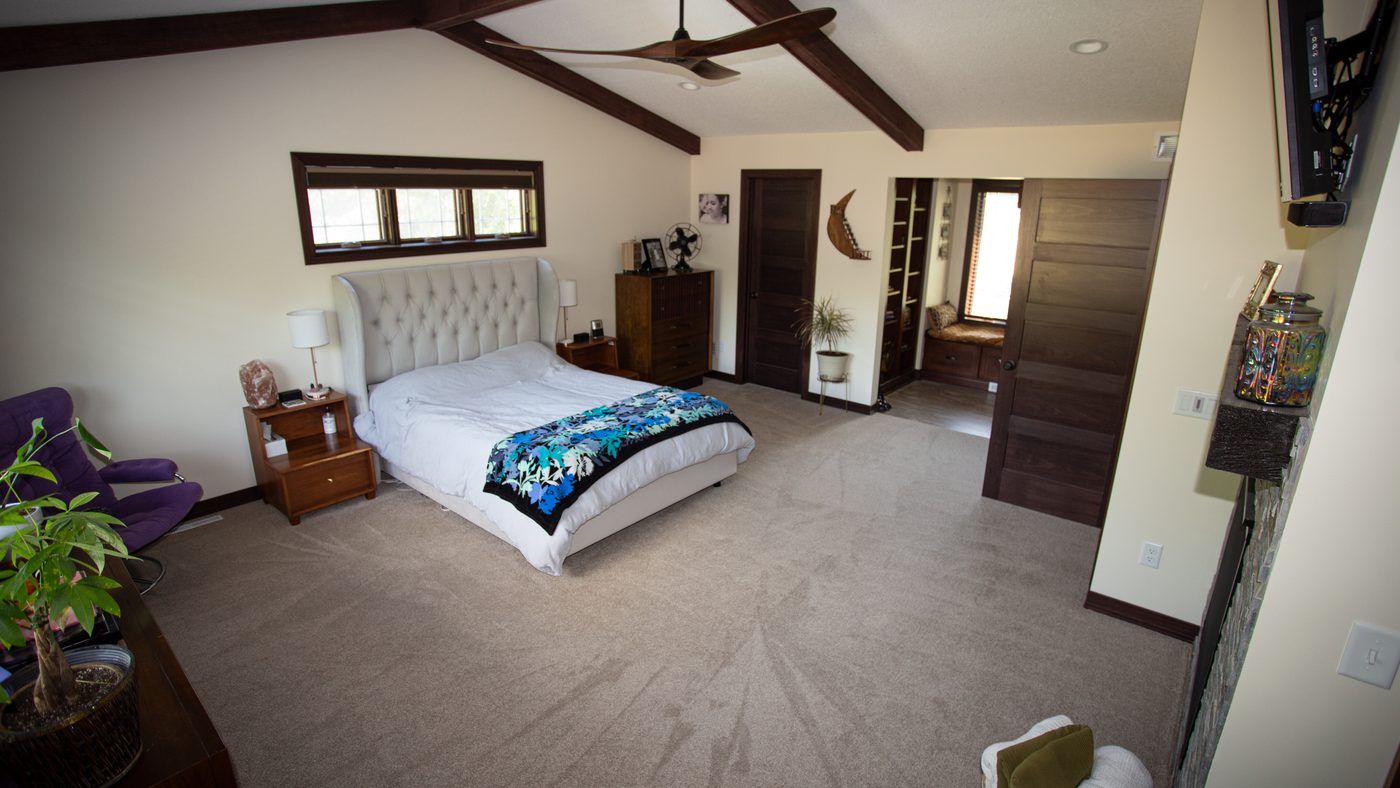 Expansive garage and master bedroom addition by BN Builders