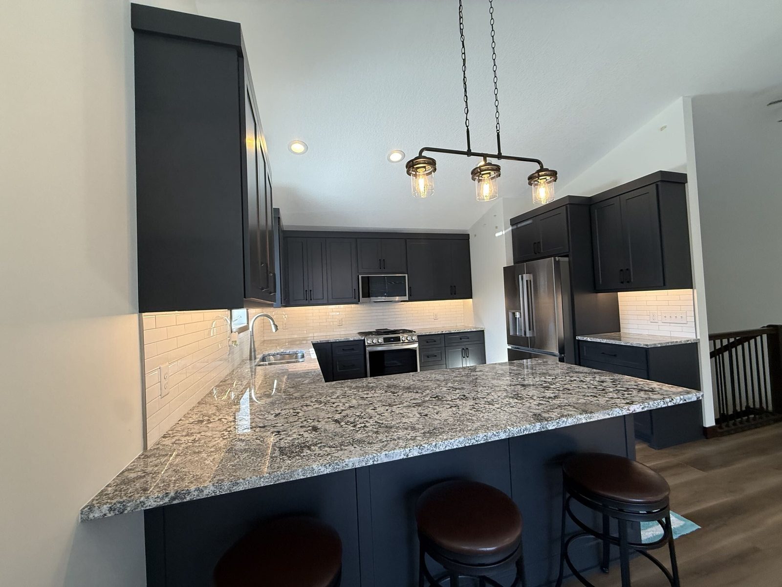 Reconfigured open-plan kitchen and living area by BN Builders